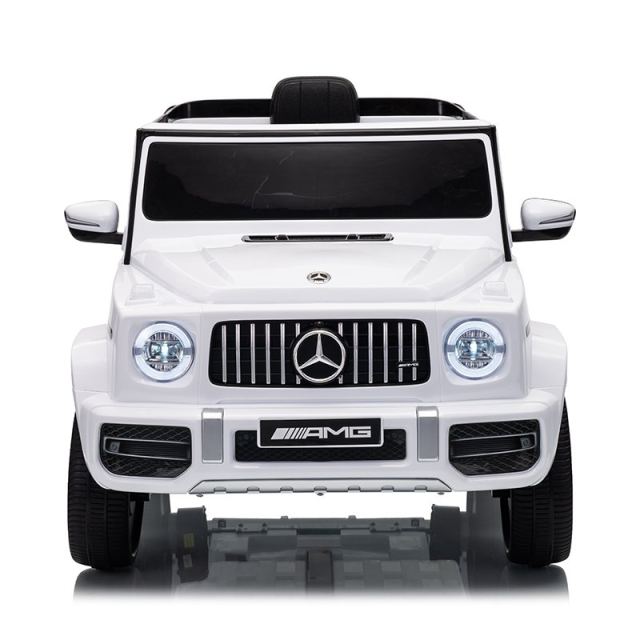 Masinuta electrica pentru copii cu licenta Mercedes-Benz G63 Alb, telecomanda 2.4G, scaun din piele, lumini LED, oglinzi retrovizoare, muzica, usi inalte cu deschidere, suspensii, centura de siguranta