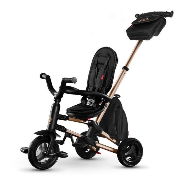 Tricicleta pentru copii Qplay Nova Rubber Gold Limited Edition ultrapliabila, cu scaun rotativ, pozitie de somn, 2 suporturi de picioare, roti din cauciuc, copertina cu protectie UV si cadru de aluminiu anodizat in culoarea a